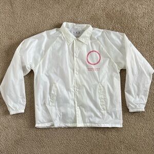 tde. White Windbreaker with Pink Logo
